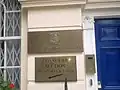 Plaque outside the embassy depicting the Coat of arms of Liberia