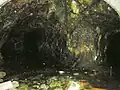 Inside the mine. The main adit heads straight on, with the longest tunnel branching off to the right
