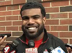 Ezekiel Elliott picture while being questioned by reporters in 2015 when he played for Ohio State