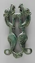 Feline animal finial with rings