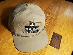 Hat and medallion for a Front Sight "First Family" member.
