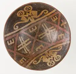 Footed bowl depicting a pair of monkeys; 750–1250; resist-painted ceramic; height: 8.9&nbsp;cm (31⁄2 in.), diameter of the bowl: 20.48&nbsp;cm (81⁄16 in.), diameter of the foot: 7.94&nbsp;cm (31⁄8 in.); Los Angeles County Museum of Art (USA)