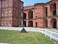 Courtyard with cannon balls.