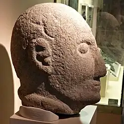 A Gallaecian warrior's head, wearing helmet and a torc. Museo Provincial de Ourense