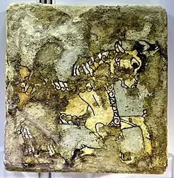 Glazed brick depicting a wild goat, from Nimrud, Iraq, 9th–7th century BC