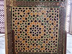 Tile decoration (zellij) along the lower walls
