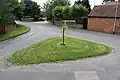 A grass triangle at the centre of Hawksworth