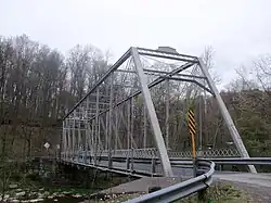 Grimms Bridge (1884) crosses the Little Beaver Creek east of State Route 170