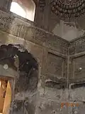 The tombs interior is decorated with calligraphy