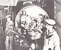 The starboard 12-inch (305&nbsp;mm) Mark VIII gun in one of the turrets aboard the British battleship HMS Caesar. The gun's breech is closed.