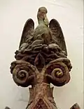 Comical albatross nest on pinnacle (1866) on memorial tablet, Holy Trinity, Low Moor