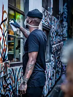 Street artist at work, 2017