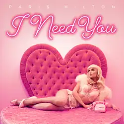 An image of Paris Hilton posing in lingerie on a bed near a rotary telephone. The image has the song's title and Hilton's name.