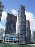 Icon Brickell Towers under construction from the Brickell Key bridge (Biscayne Bay)