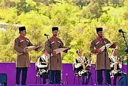Jahan, an Avar folklore group, performs the song "Dun guri yo" on dambur&nbsp;[ru]