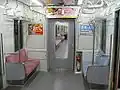 Priority seating (right) at end of car