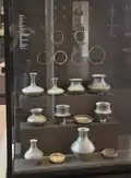 Burial goods including pottery and torc necklaces