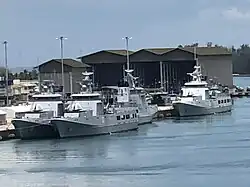 KDB Darulehsan (07) and KDB Darussalam (06) moored alongside their two sisters in port at Muara Naval Base.