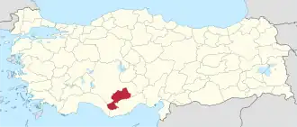 Karaman highlighted in red on a beige political map of Turkeym