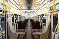 The interior with seats arranged in transverse configuration