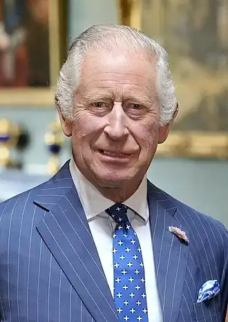 King Charles III in a suit