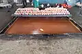 Another photo of Kolhapur jaggery in semi-liquid form filled in the "Vafaa" rectangular section.