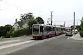 An outbound train at Ulloa Street and Forest Side Avenue, 2017