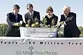 Mrs. Laura Bush is joined by, from left, U.S. Department of Agriculture Secretary Mike Johanns; John Rosenow, president of the National Arbor Day Foundation, and Andy Taylor, chairman and CEO of Enterprise, for the 50 Million Tree Pledge.