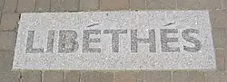 An inscription, reading "Liberated" in Jèrriais, was installed at La Pièche dé l'Av'nîn in St. Helier to mark the 60th anniversary of the Liberation in 2005