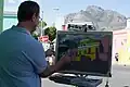 Local artist, Christopher Reid, Painting en plein air in Bo-Kaap.