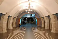 View from the central hall towards the station's escalator tunnel.