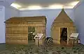 The woven huts in which they live and make cheese
