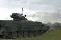 A German Army Marder fires its Rh202 20&nbsp;mm cannon on a training exercise.