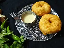 Medu vadas served with coconut chutney
