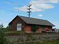 The adjacent freight house, built in 1909 to replace the one destroyed in the 1905 wreck of the 20th Century Limited.