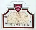 Roero house on Via San Martino, detail of the sundial with the Roero coat of arms