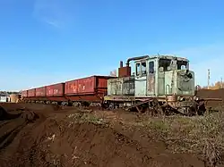 Locomotive TU4-2314 with freight train