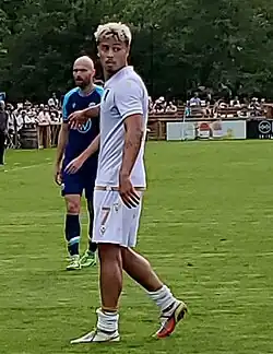 Player on the pitch looking behind him