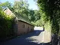 Much Woolton Old School, School Lane, Woolton (c.1610; Grade II*)