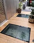 Old cobblestones under glass floor