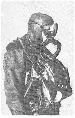 A French frogman with chest counterlung loop rebreather with two breathing tubes (model "Oxygers", 1957).