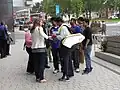 Karunaratne signing autographs for fans