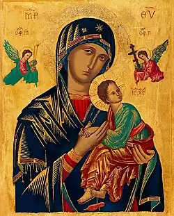 A traditional depiction of Maryby Fra Angelico wearing a blue mantle