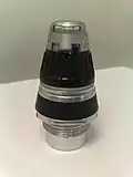A 155&nbsp;mm artillery fuze with selector for point/proximity detonation (currently set to proximity).