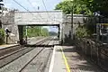 Looking northwards along the rail track and to the right beside the bridge was the location of the old station building which was completely demolished.