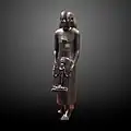 Priest of Bastet (Louvre)[6]