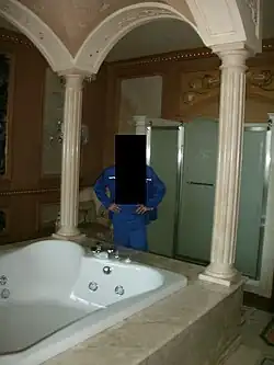 A multi-person jacuzzi in one of the residence's bedrooms.