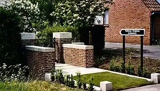 Stones at entrance to Railway Chateau Commonwealth War Graves Commission cemetery