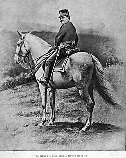 First instant photograph ever taken in Guatemala. Valdeavellano made it on 28 June 1896. It shows then president general José María Reina Barrios observing son military drills in Guatemala City.[4]