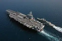 Ronald Reagan makes final preparations to provide fuel to the Royal Australian Navy frigate HMAS&nbsp;Ballarat during a Fueling At Sea (FAS) evolution, 21 April 2006